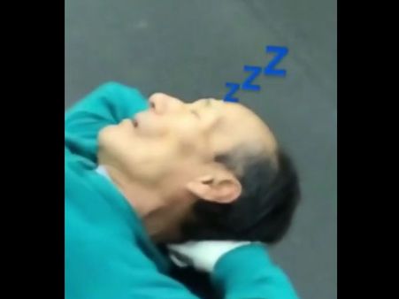 This elderly man is taking a nap in the most unusual of places; watch