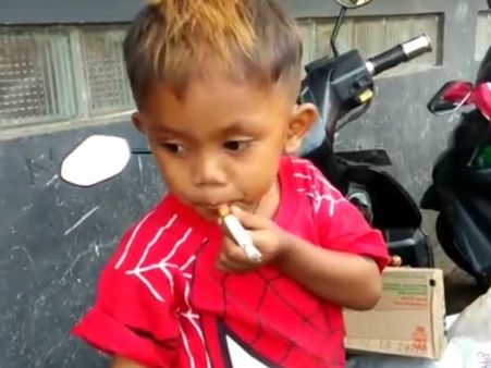 This two-year-old needs two packs of cigarettes every day, else he gets upset