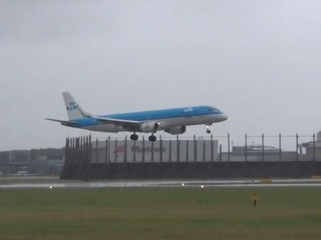 Big wibbly-wobbly plane makes nervous landing in strong wind