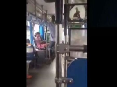 This bus driver can’t remain idle even when his vehicle stops at red signal