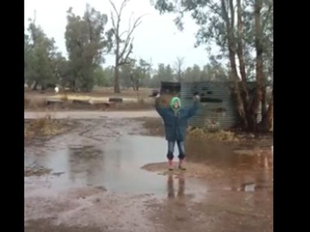 Rain makes this woman dance and she has a valid reason to celebrate