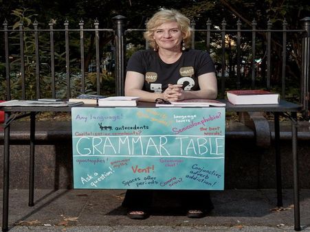 She sits on the road side to clear people’s grammar confusion & also serve a greater purpose