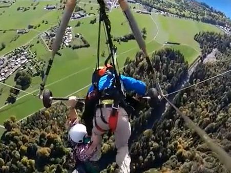 Tourist clings on to for life on hang-glider in the air; says later ‘I will go again’