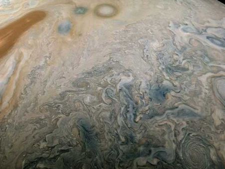 Stunning images of Jupiter captured by NASA's Juno as it reaches halfway point
