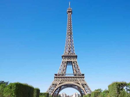 Eiffel Tower evacuated after man climbs the Paris landmark
