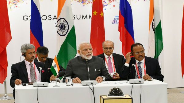 Modi holds trilateral with Xi & Putin; discusses hot-spot issues like terrorism & climate change