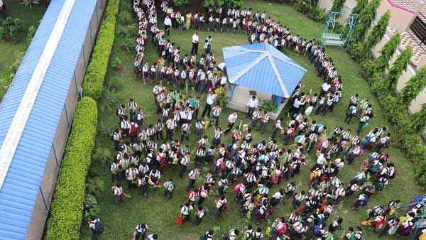 With more than 5,000 trees planted, school pledges for greener tomorrow