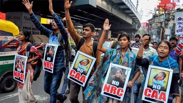 TMC women members in Kolkata sport mehendi with no 'CAA' , 'NRC' slogan
