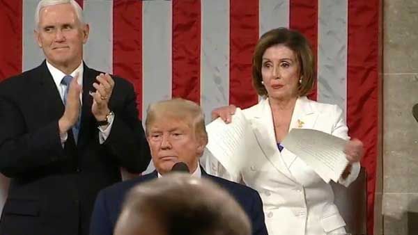 Trump snubs Pelosi handshake, she tears up his speech