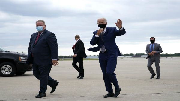 Trump mocks the way Biden wears his mask