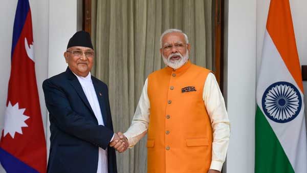 K P Oli wishes PM Modi on his birthday