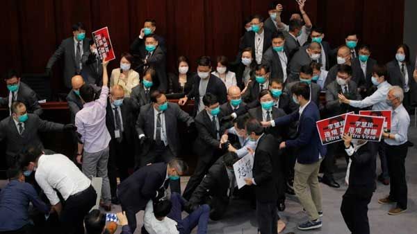 Hong Kong lawmakers arrested for disrupting legislature