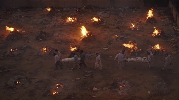 Covid-19 and crematorium: Slum dwellers in Delhi grapple with smoke, stench and fear of disease