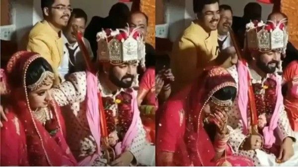 Viral video: Groom rests hand on shoulder of bride, Check what happens next