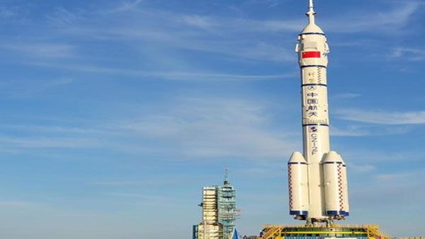 Rocket moves to launch pad as China prepares to send three astronauts to its space station
