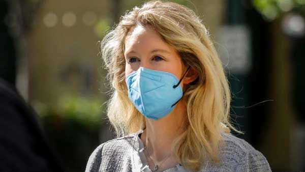 Theranos founder Elizabeth Holmes takes stand in fraud trial