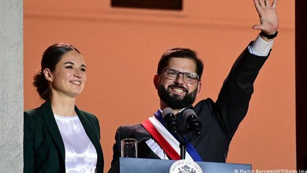 Chile swears in former student leader as youngest president