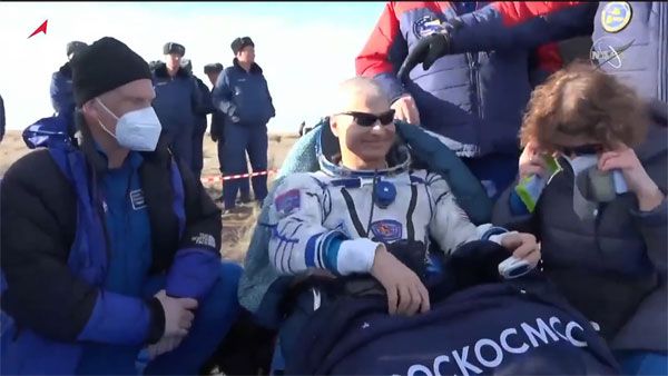 US astronaut returns to Earth after record-breaking mission; Russian cosmonaut says, 'on orbit we are one crew