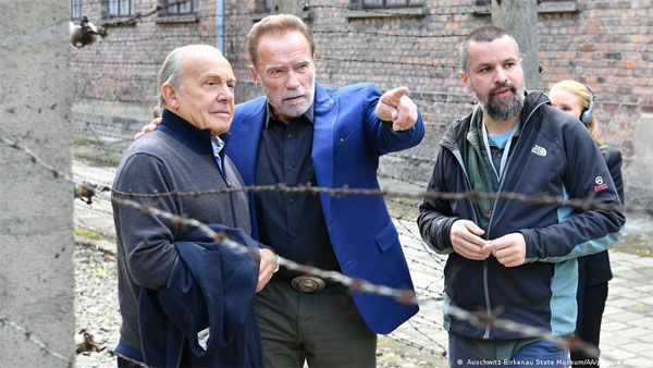 Schwarzenegger visits Auschwitz to fight hate