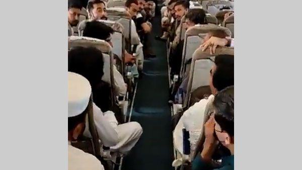 Dramatic video of Pakistan passenger stripping, kicking window onboard flight goes viral