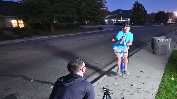 Fruit Ninja: Man creates record cutting apples while bouncing on a pogo stick