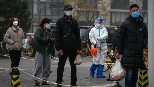 China gives in to massive protests, eases COVID-19 restrictions