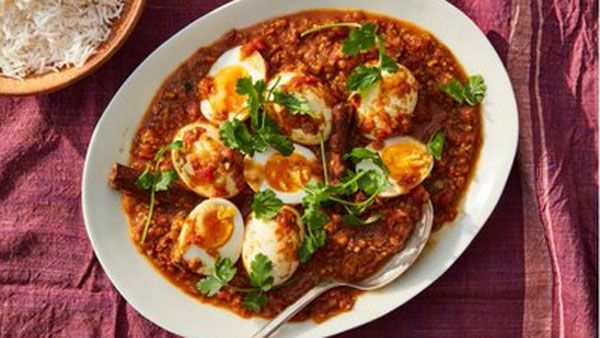 Why does an egg curry recipe on NYT have an anti-Modi rant