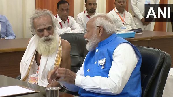 Who Is The Sadhu Sitting Next To PM Modi As He Filed Nomination Papers In Varanasi?