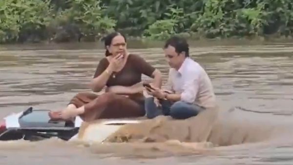 Couple Stranded On Car Roof During Gujarat Floods, Remain Surprisingly Calm
