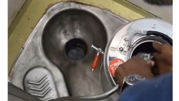 Viral Video Shows Man Washing Tea Container With Jet Spray In Train Toilet, Netizens Furious | WATCH