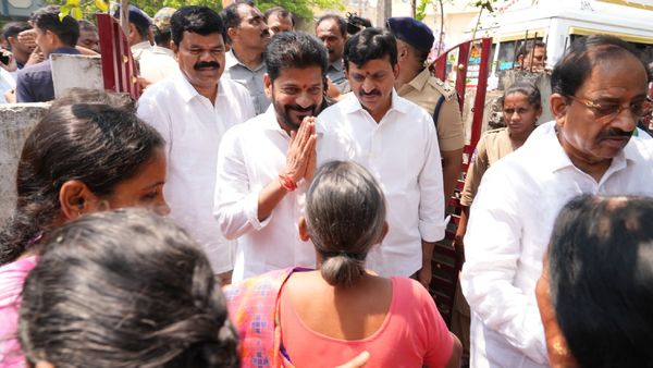 Telangana CM Revanth Reddy Shares Lunch with Beneficiary Family of 