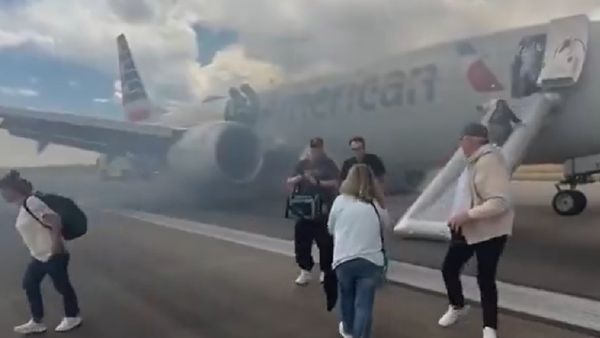 Landing Gear Fire Forces Emergency Evacuation of American Airlines Flight at Denver Airport