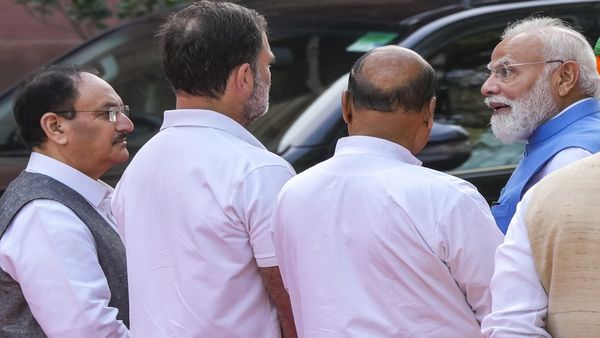 PM Modi, Rahul Gandhi's Rare Candid Moment At Phule Tribute In Parliament - WATCH