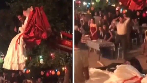 ವಿಡಿಯೋ: ಬುಲ್ಡೋಜರ್‌ನಲ್ಲಿ ಕುಳಿತು ಗ್ರ್ಯಾಂಡ್ ಎಂಟ್ರಿ ವೇಳೆ ಕೆಳಗೆ ಬಿದ್ದ ಕಪಲ್ಸ್