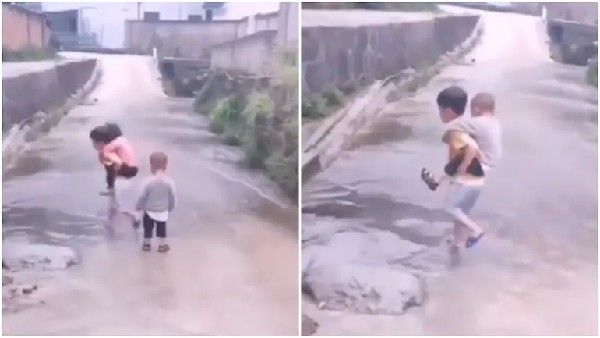 ವಿಡಿಯೋ: ಒಡಹುಟ್ಟಿದವರನ್ನು ಎತ್ತಿಕೊಂಡು ರಸ್ತೆಗುಂಡಿ ದಾಟಿಸಿದ ಬಾಲಕ