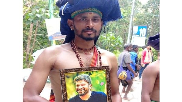 ಶಬರಿಮಲೆಯಲ್ಲಿ ಪುನೀತ್‌ ಫೋಟೊ ಹಿಡಿದು ಸರತಿ ಸಾಲಿನಲ್ಲಿ ನಿಂತ ಭಕ್ತ