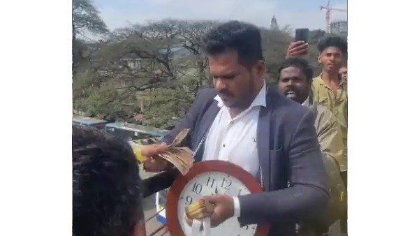 ಮಾರ್ಕೆಟ್ ಫ್ಲೈ ಓವರ್‌ನಿಂದ ಹಣ ಎಸೆದು, ಟ್ರಾಫಿಕ್ ಜಾಮ್ ಮಾಡಿದ್ದು ಯಾಕೆ ಗೊತ್ತೆ? ಪೊಲೀಸರು ಹೇಳಿದ್ದು ಹೀಗೆ