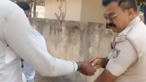 ಲಾರಿ ಚಾಲಕನಿಂದ ಲಂಚದ ಹಣಕ್ಕೆ ಕೈ ಚಾಚಿದ ಎಎಸ್‌ಐ: ವಿಡಿಯೋ ವೈರಲ್