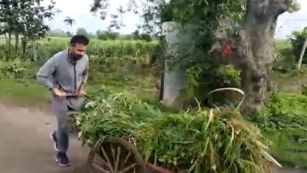 Santosh Lad: ರೈತನ ಹುಲ್ಲಿನ ಬಂಡಿ ತಳ್ಳಿ ಸರಳತೆ ಮೆರೆದ ಸಚಿವ ಸಂತೋಷ್‌ ಲಾಡ್: ಗ್ರಾಮಸ್ಥರು ಫುಲ್ ಖುಷ್