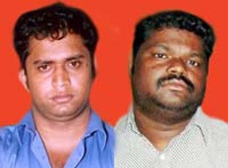 പോള്‍ വധം: ഓംപ്രകാശും രാജേഷും കീഴടങ്ങി