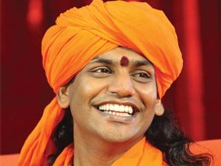 വിവാദ സ്വാമി നിത്യാനന്ദ കോടതിയില്‍ കീഴടങ്ങി