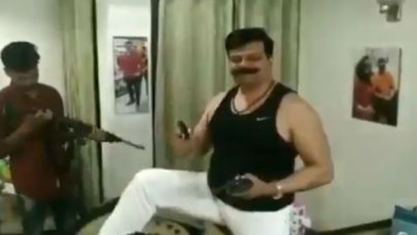 രണ്ട് കൈയ്യിലും തോക്ക്, പിന്നെ മദ്യ ഗ്ലാസ്സ്... ബിജെപി എംഎല്‍എയുടെ കിടിലന്‍ ഡാൻസ്; പക്ഷേ പണികിട്ടും