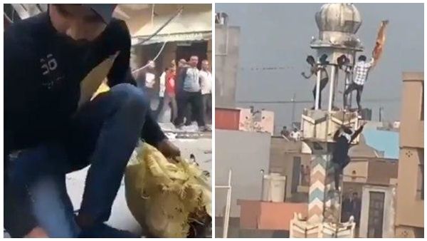 അക്രമികള്‍ കത്തിച്ച പള്ളിമുറ്റത്ത് നിന്ന് കത്തിയെരിഞ്ഞ ഖുറാന്‍ ശേഖരിക്കുന്ന ഹിന്ദു യുവാക്കള്‍,വീഡിയോ