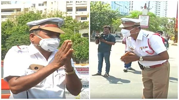 ദയവുചെയ്ത് തിരിച്ച് വീട്ടിൽ പോകൂ, യാത്രക്കാർക്ക് മുന്നിൽ കൈ കൂപ്പി പൊട്ടിക്കരഞ്ഞ് പോലീസുകാരൻ!