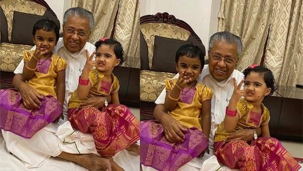 ചമ്രം പടിഞ്ഞിരുന്ന് കുഞ്ഞുങ്ങള്‍ക്കൊപ്പം മുഖ്യമന്ത്രി; വൈറലായി ചിത്രം, ആരാണ് ഈ കുട്ടികള്‍