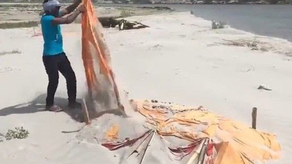 അജ്ഞാത ശവക്കുഴികള്‍ക്ക് മുകളിലെ തുണി നീക്കി യോഗി സര്‍ക്കാര്‍, ഗംഗാ തീരത്ത് ഞെട്ടിക്കുന്ന കാഴ്ച്ച