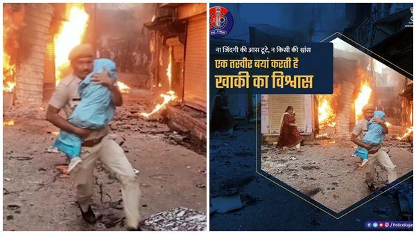 കലാപത്തിനിടെ കുഞ്ഞിനെ നെഞ്ചോട് ചേർത്ത് പിടിച്ച് രക്ഷിച്ച് പോലീസുകാരൻ, കയ്യടിച്ച് സോഷ്യൽ മീഡിയ