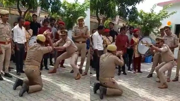 നിലത്തിരുന്നും, മകുടി ഊതിയും നാഗ നൃത്തമാടി യുപി പോലീസ്, പിന്നാലെ നടപടി... വീഡിയോ