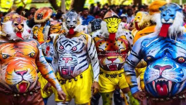 കുംഭ കുലുക്കി നിറഞ്ഞാടാൻ പുലികളെത്തി, പൊടിപൂരത്തിനൊരുങ്ങി അനന്തപുരി