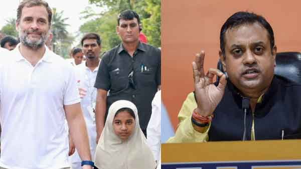 ഹിജാബ് ധരിച്ച പെണ്‍കുട്ടിക്കൊപ്പം രാഹുല്‍ ഗാന്ധി, പ്രീണനമെന്ന് ബിജെപി; തിരിച്ചടിച്ച് കോണ്‍ഗ്രസ്